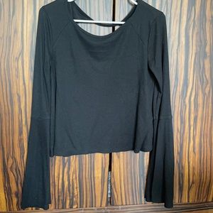 Women’s long sleeve sweater with open back